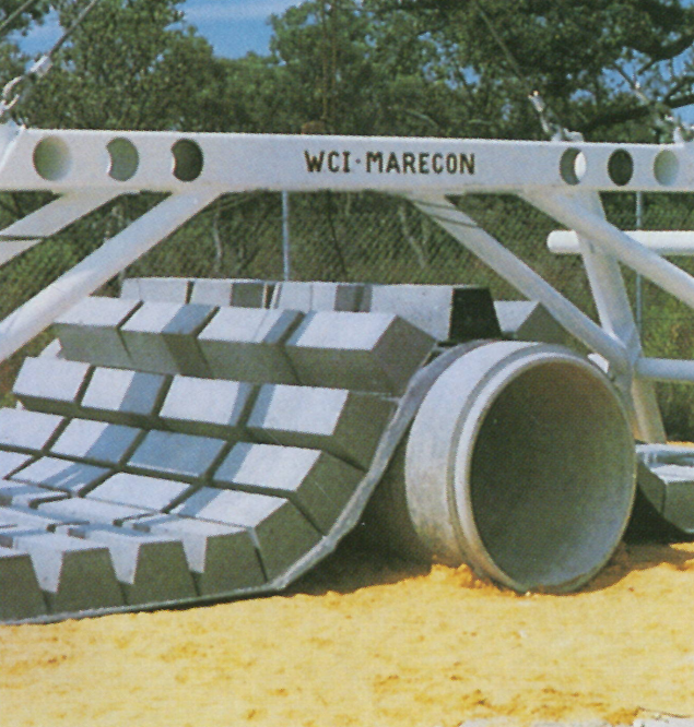 Concrete pipe with Flexmat™ concrete block mat over the pipe  acting as an anchor